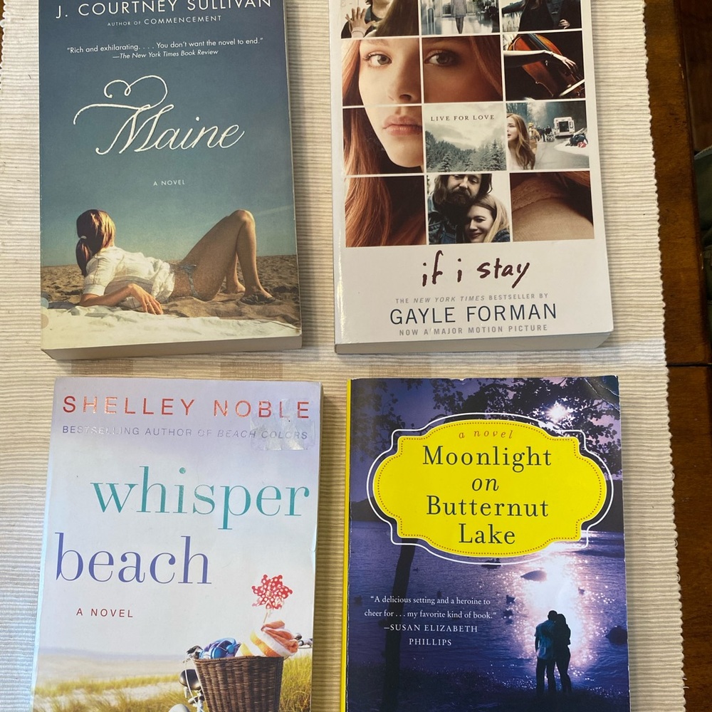 Four young adult books.